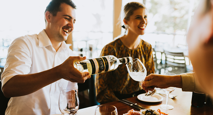 Friends enjoying wine at the Trentham Estate restaurant